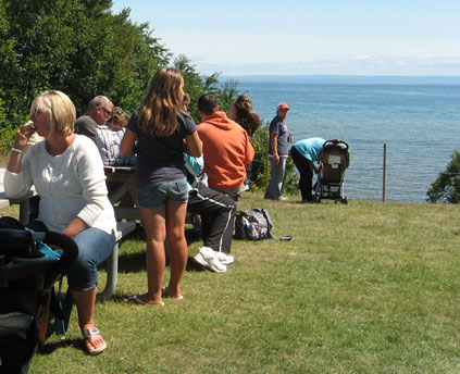 Families gathering in view of Whitefish Bay